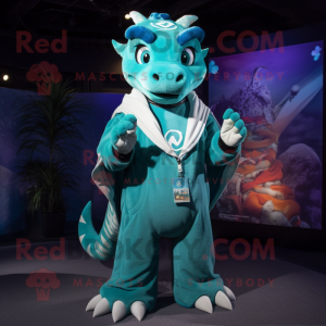 Teal Dragon mascot costume character dressed with a Sweatshirt and Rings