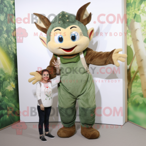 Olive Tooth Fairy mascot costume character dressed with a Dungarees and Rings