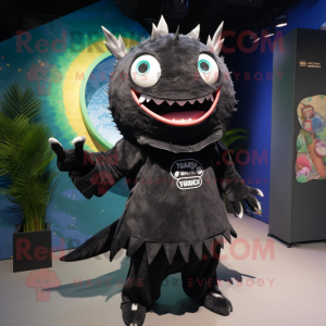 Black Tuna mascot costume character dressed with a Playsuit and Shawls