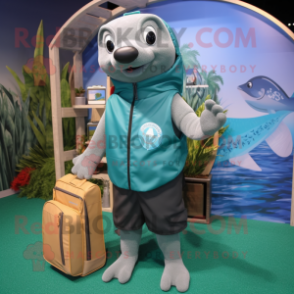 Teal Cod mascot costume character dressed with a Board Shorts and Tote bags