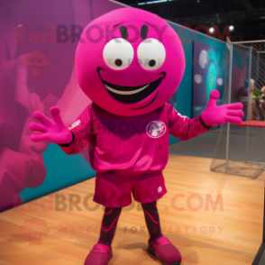 Magenta Volleyball Ball mascot costume character dressed with a T-Shirt and Cufflinks