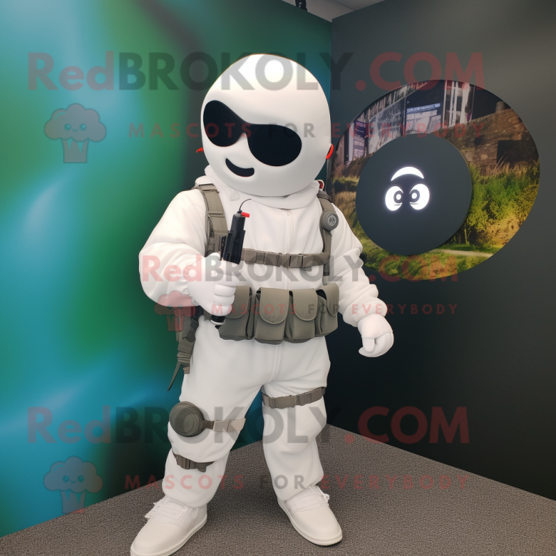 White Para Commando mascot costume character dressed with a Blazer and Keychains White Para Commando mascot costume character dressed with a Blazer and Keychains