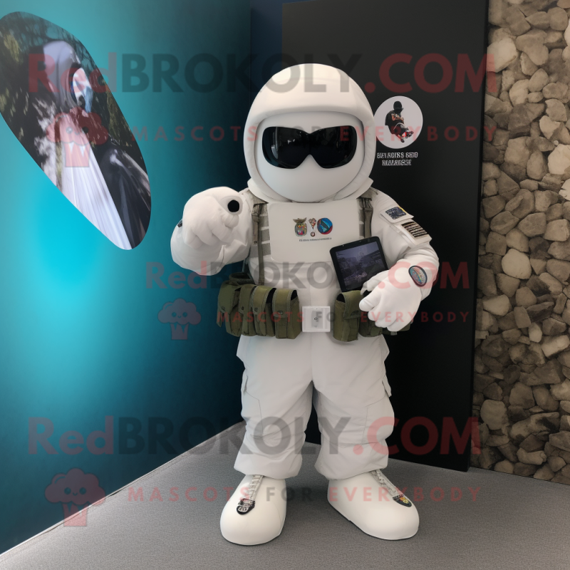 White Para Commando mascot costume character dressed with a Blazer and Keychains White Para Commando mascot costume character dressed with a Blazer and Keychains