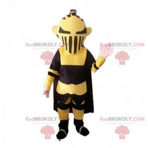 Black and yellow robot mascot resembling Darth Vader -