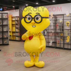 Yellow Heart Shaped Balloons mascot costume character dressed with a Romper and Reading glasses