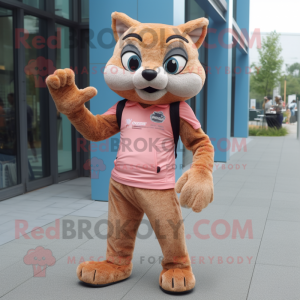 Peach Jaguarundi mascot costume character dressed with a Skinny Jeans and Gloves