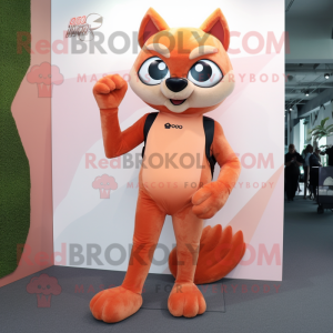 Peach Jaguarundi mascot costume character dressed with a Skinny Jeans and Gloves