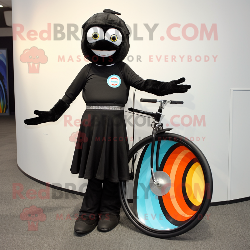 Black Unicyclist mascot costume character dressed with a Wrap Dress and Ties Black Unicyclist mascot costume character dressed with a Wrap Dress and Ties