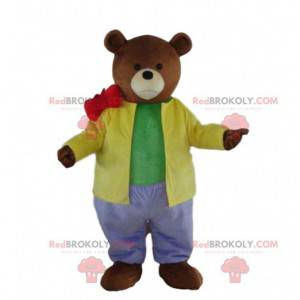 Mascote do urso de pelúcia em traje colorido, fantasia de urso