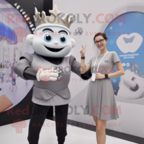 Gray Queen mascot costume character dressed with a Oxford Shirt and Smartwatches