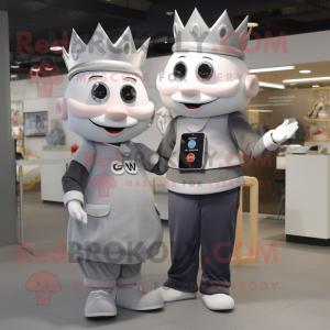 Gray Queen mascot costume character dressed with a Oxford Shirt and Smartwatches