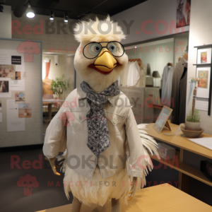 Beige Hens mascot costume character dressed with a Button-Up Shirt and Shawl pins