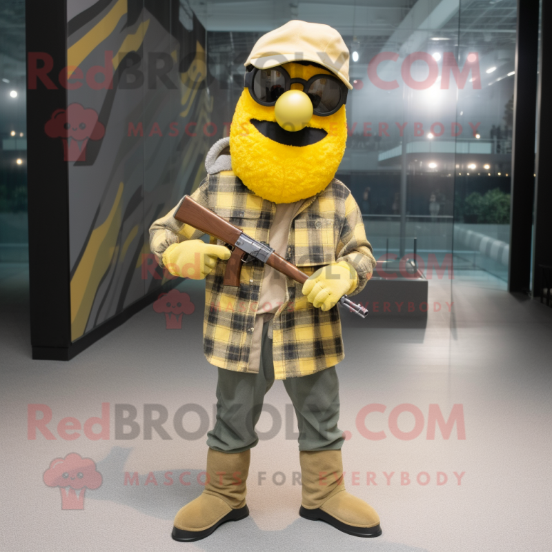 Yellow Sniper mascot costume character dressed with a Flannel Shirt and Berets