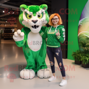 Green Saber-Toothed Tiger mascot costume character dressed with a Mom Jeans and Rings