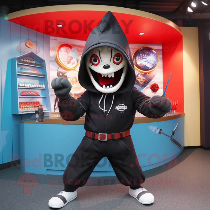 nan Knife Thrower mascot costume character dressed with a Hoodie and Rings nan Knife Thrower mascot costume character dressed with a Hoodie and Rings