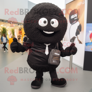 Black Falafel mascot costume character dressed with a Suit Pants and Backpacks