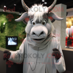 Gray Zebu mascot costume character dressed with a Hoodie and Hair clips