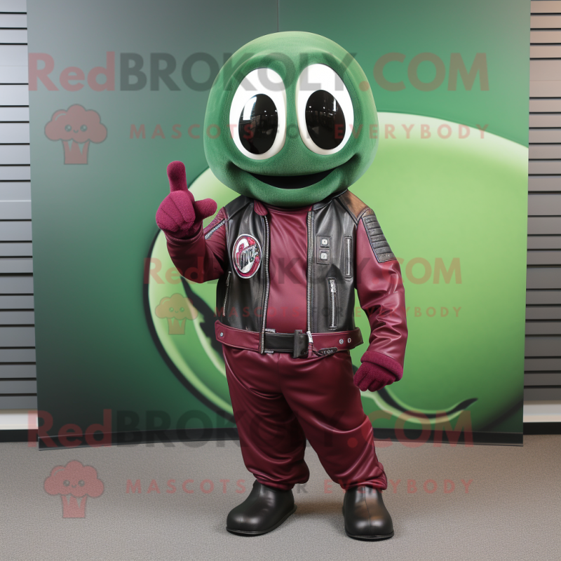 Maroon Green Bean mascot costume character dressed with a Biker Jacket and Rings