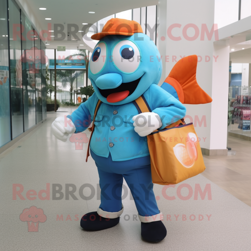 Sky Blue Clown Fish mascot costume character dressed with a Poplin Shirt and Tote bags