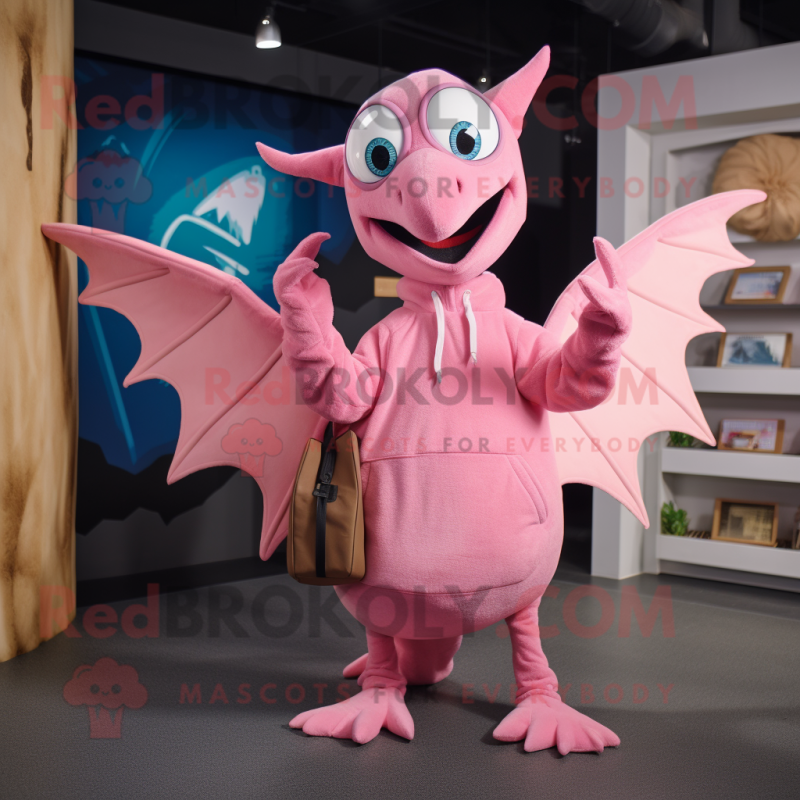 Pink Pterodactyl mascot costume character dressed with a Sweatshirt and Handbags Pink Pterodactyl mascot costume character dressed with a Sweatshirt and Handbags