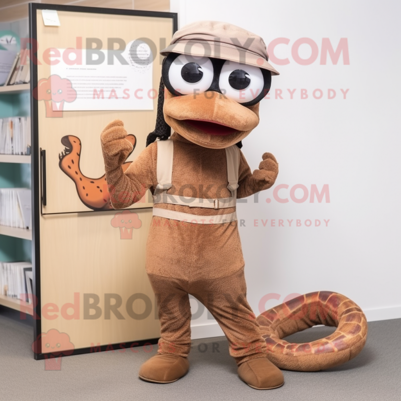 Brown Snake mascot costume character dressed with a Dungarees and Reading glasses