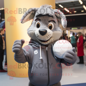 Gray Rugby Ball mascot costume character dressed with a Hoodie and Gloves