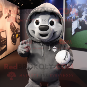 Gray Rugby Ball mascot costume character dressed with a Hoodie and Gloves