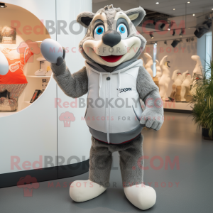 Gray Rugby Ball mascot costume character dressed with a Hoodie and Gloves