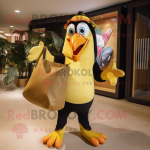 Gold Toucan mascot costume character dressed with a Playsuit and Tote bags