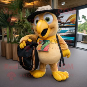 Gold Toucan mascot costume character dressed with a Playsuit and Tote bags