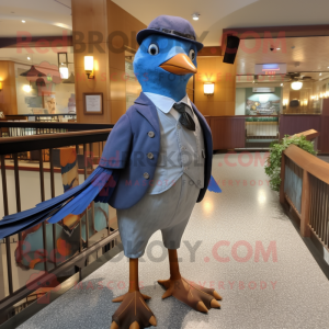 Blue Passenger Pigeon mascot costume character dressed with a Graphic Tee and Tie pins