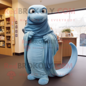 Sky Blue Titanoboa mascot costume character dressed with a Culottes and Shawl pins