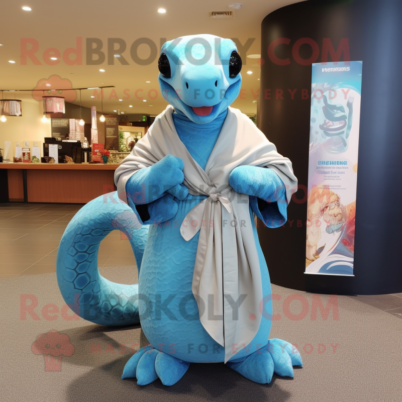 Sky Blue Titanoboa mascot costume character dressed with a Culottes and Shawl pins Sky Blue Titanoboa mascot costume character dressed with a Culottes and Shawl pins