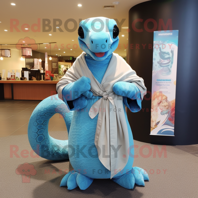 Sky Blue Titanoboa mascot costume character dressed with a Culottes and Shawl pins