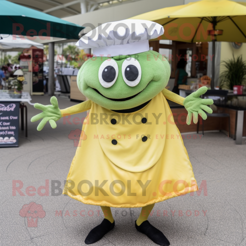 Olive Crab Cakes mascot costume character dressed with a Circle Skirt and Hat pins Olive Crab Cakes mascot costume character dressed with a Circle Skirt and Hat pins
