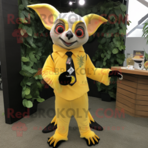 Yellow Fruit Bat mascot costume character dressed with a Suit Pants and Keychains