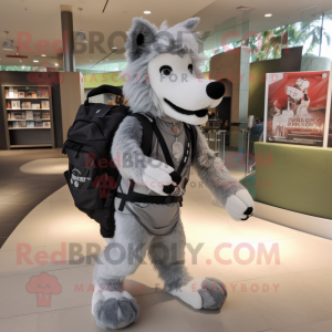 Silver Dog mascot costume character dressed with a Graphic Tee and Backpacks