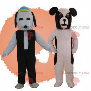 2 mascottes de chiens, costumes de chiens noirs et blancs -