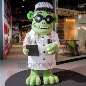 Cream Frankenstein'S Monster mascot costume character dressed with a Playsuit and Reading glasses