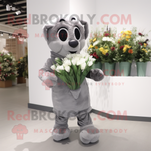 Gray Bouquet Of Flowers mascot costume character dressed with a Cover-up and Gloves