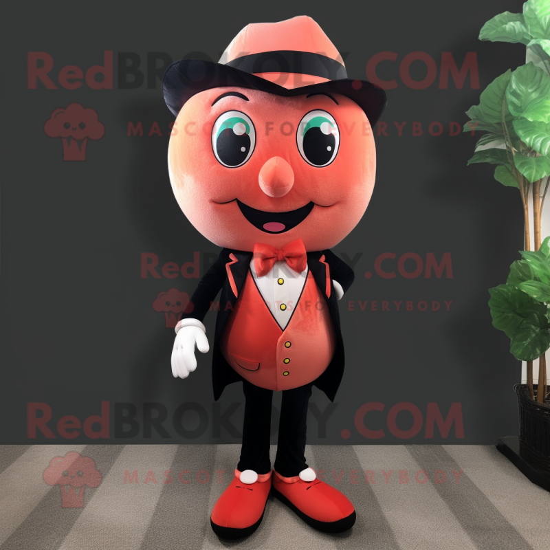 Peach Strawberry mascot costume character dressed with a Tuxedo and Shoe laces