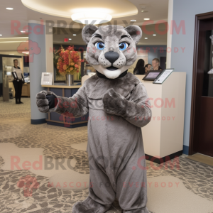 Gray Mountain Lion mascot costume character dressed with a Empire Waist Dress and Gloves