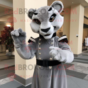 Gray Mountain Lion mascot costume character dressed with a Empire Waist Dress and Gloves