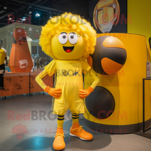 Yellow Human Cannon Ball mascot costume character dressed with a Graphic Tee and Hairpins