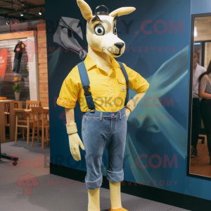 Lemon Yellow Gazelle mascot costume character dressed with a Flannel Shirt and Belts
