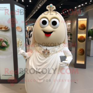 Beige Shakshuka mascot costume character dressed with a Wedding Dress and Brooches