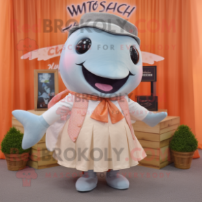 Peach Whale mascot costume character dressed with a Skirt and Pocket squares