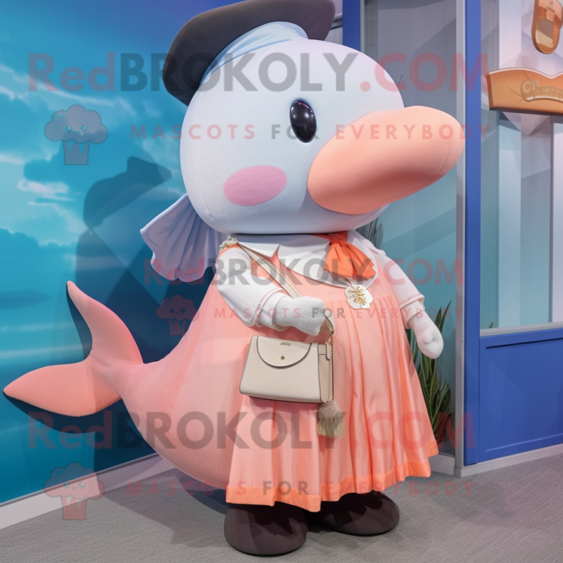Peach Whale mascot costume character dressed with a Skirt and Pocket squares Peach Whale mascot costume character dressed with a Skirt and Pocket squares