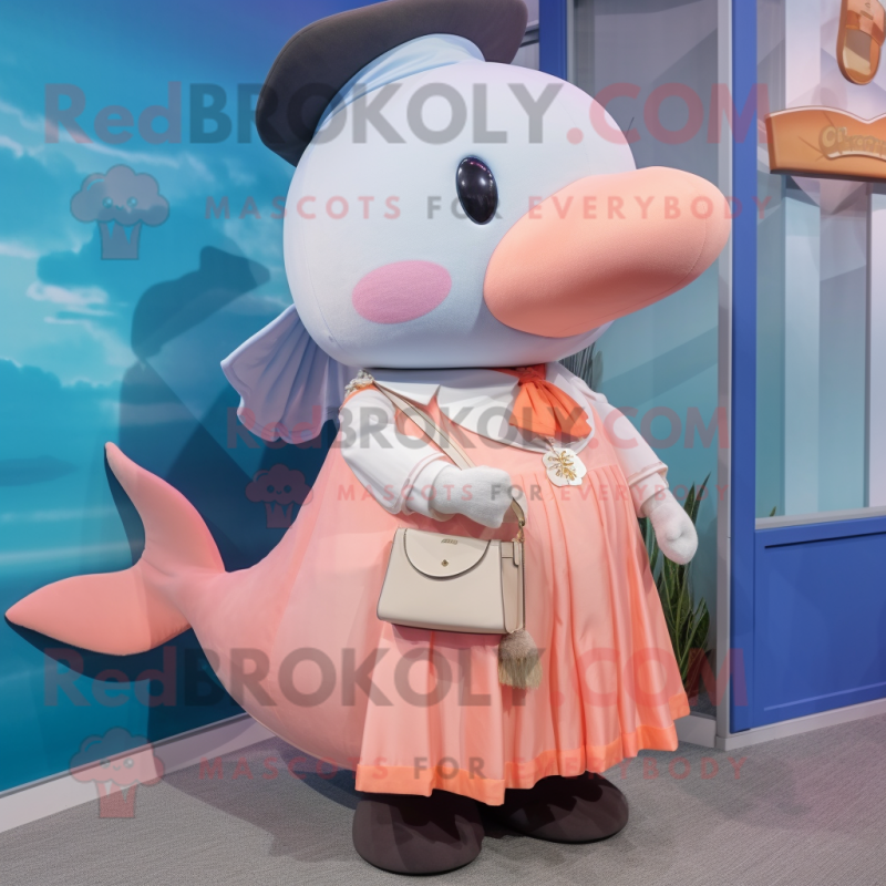 Peach Whale mascot costume character dressed with a Skirt and Pocket squares