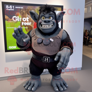 Black Ogre mascot costume character dressed with a Oxford Shirt and Smartwatches